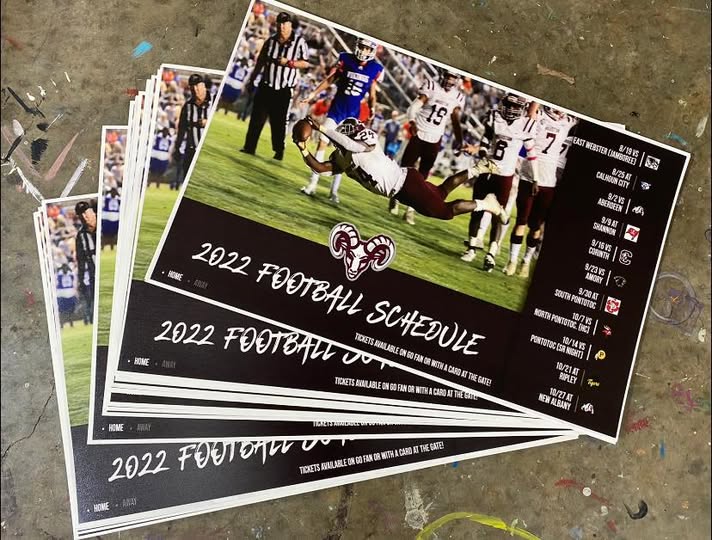 Large volume printing job showing stacks of professionally printed documents